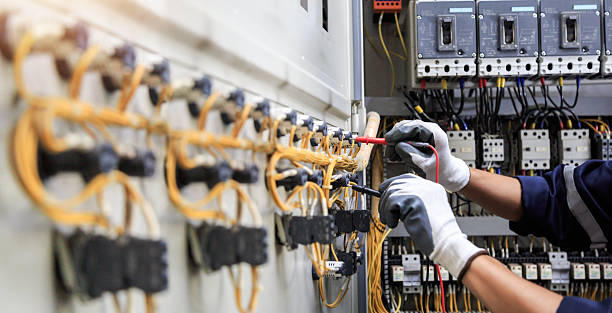 Professional Electrician technician working in Harvey, ND